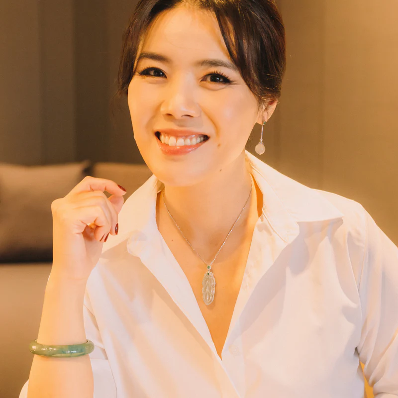 Jade Artisan brand imagery — a portrait featuring the brand's jade jewellery